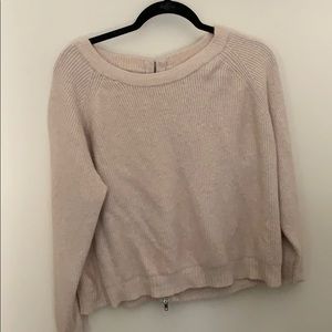 A really nice sweater. Used. Still really soft.
